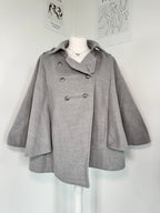 Grey poncho coat with elegant buttons