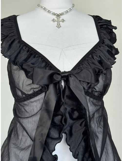 Black top with a bow an ruffles