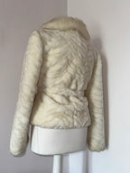 Faux fur coat with belt