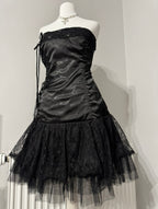 Black dark coquette mini dress with a flower detail