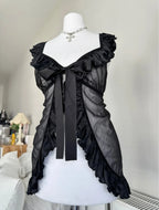 Black top with a bow an ruffles