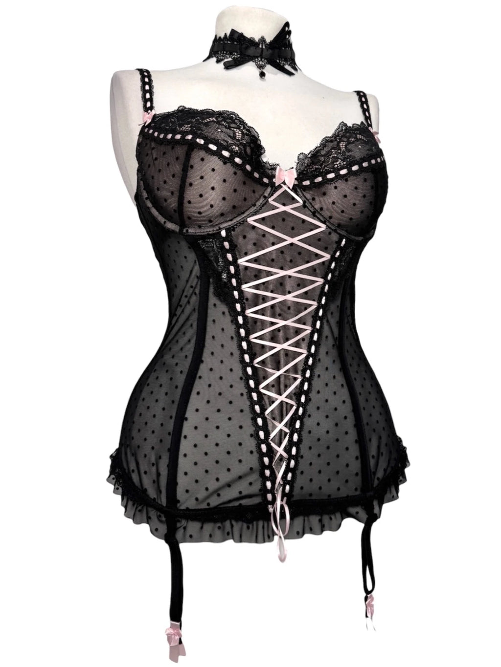 Black polka dot lace-up corset with a little bow