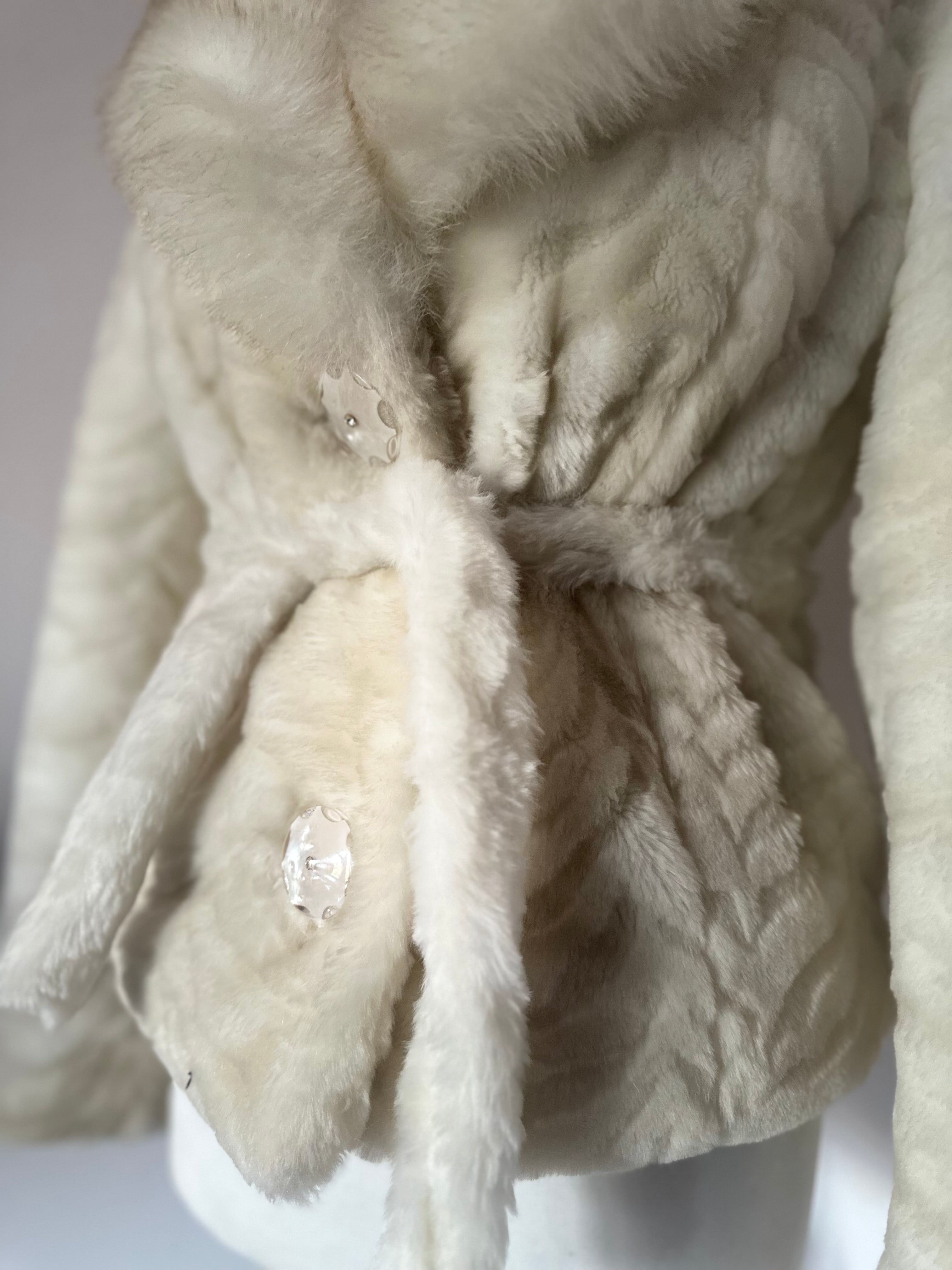 Faux fur coat with belt