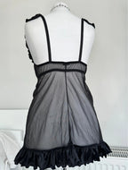 Black top with a bow an ruffles