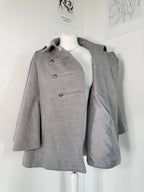 Grey poncho coat with elegant buttons