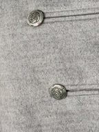 Grey poncho coat with elegant buttons