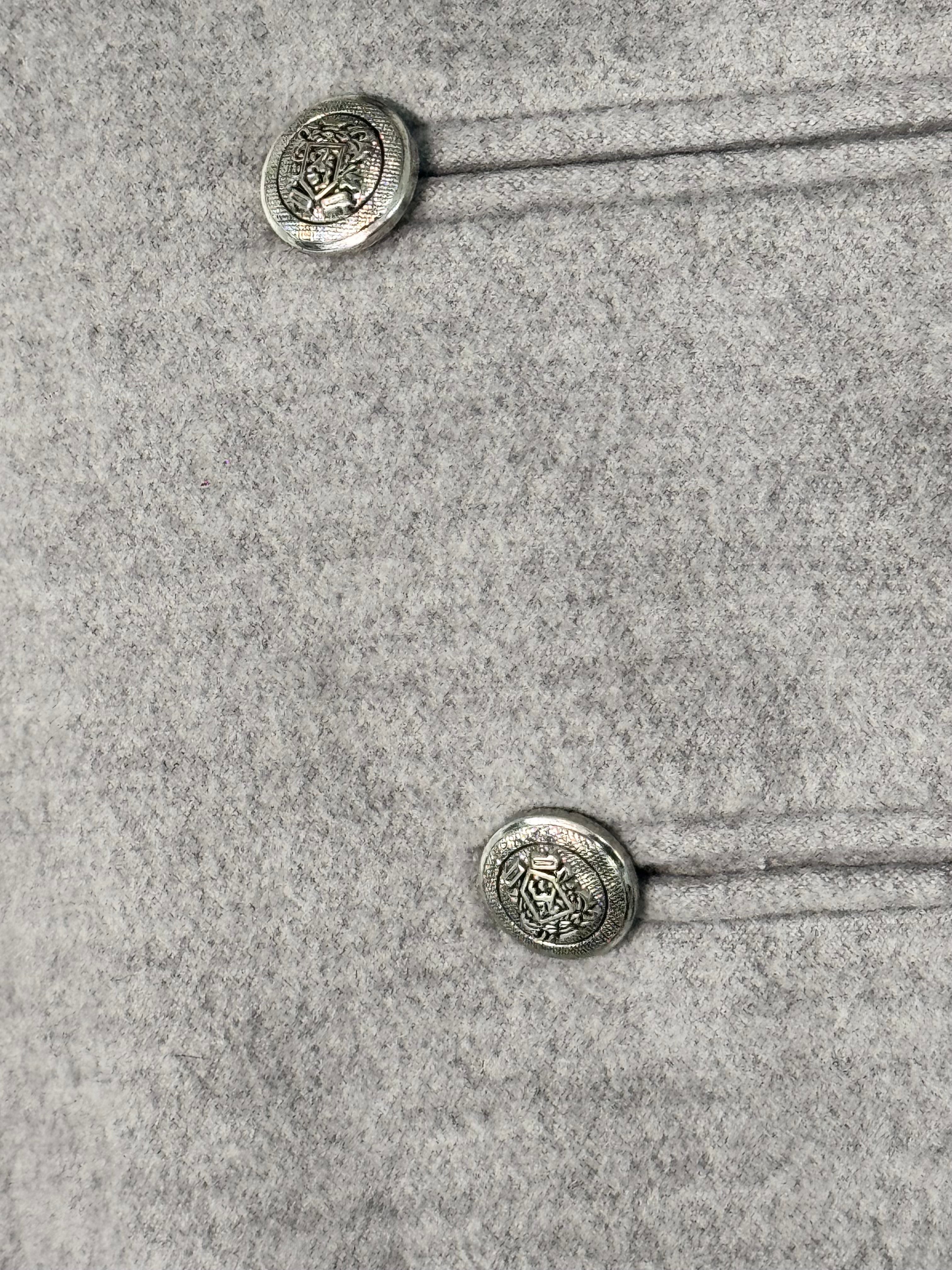 Grey poncho coat with elegant buttons