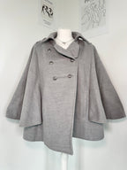 Grey poncho coat with elegant buttons