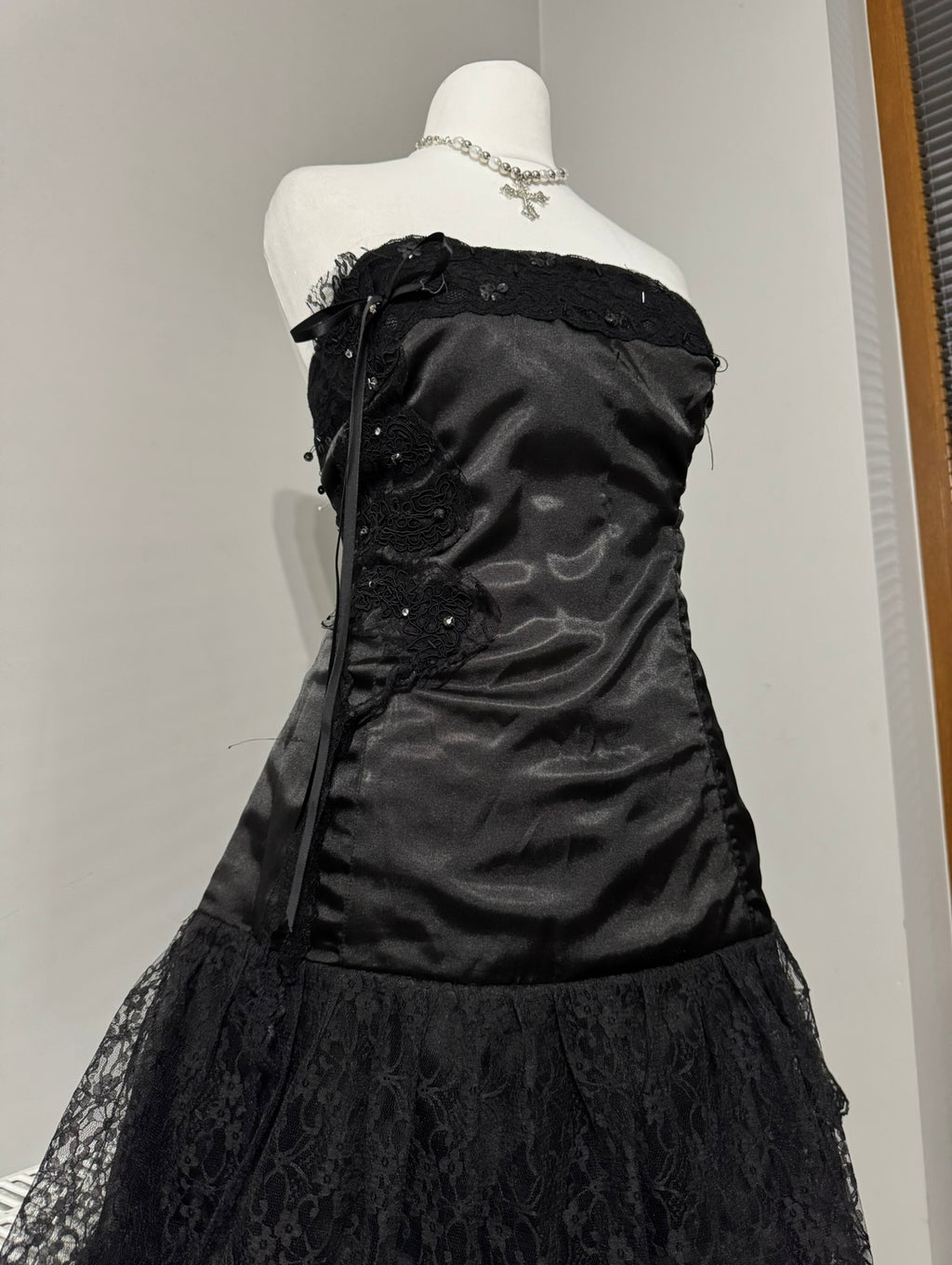 Black dark coquette mini dress with a flower detail