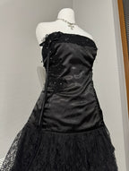 Black dark coquette mini dress with a flower detail