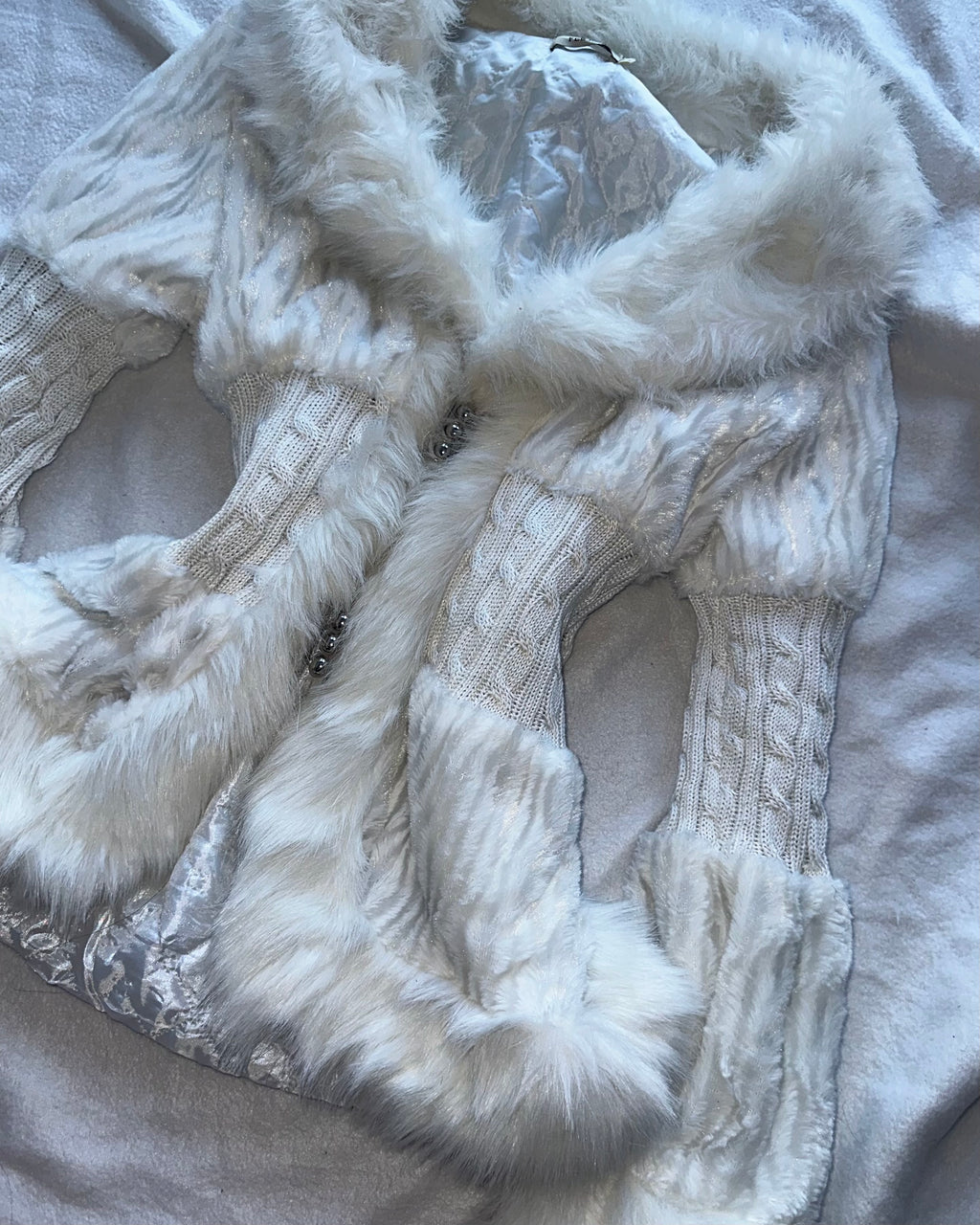 White faux fur coat
