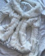 White faux fur coat