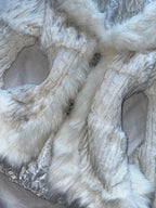 White faux fur coat