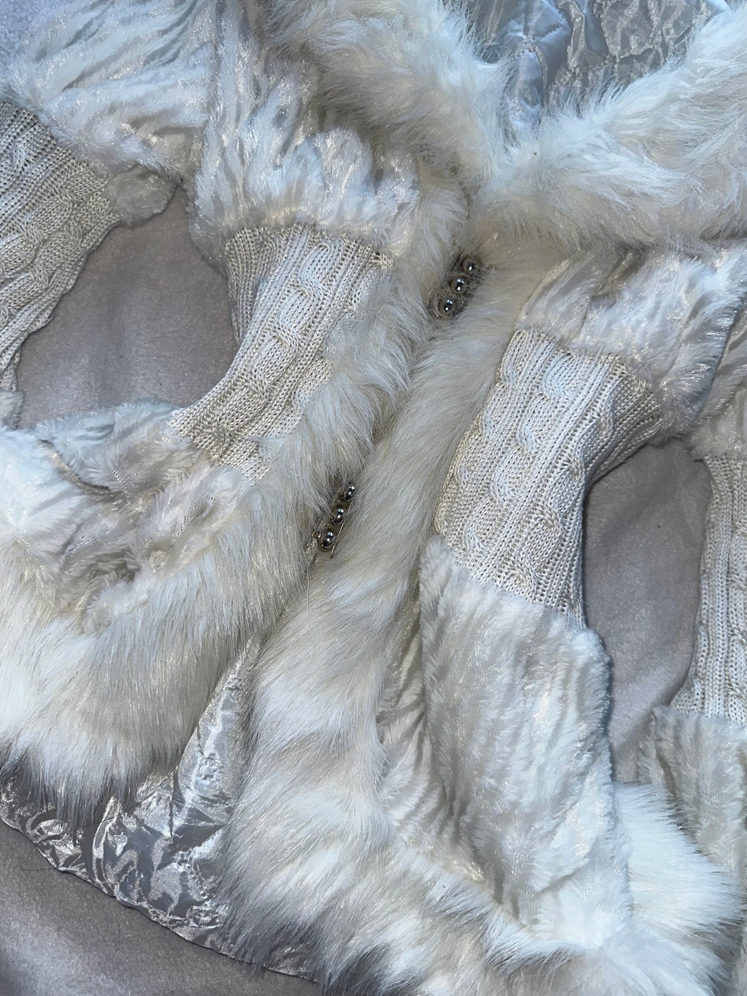 White faux fur coat