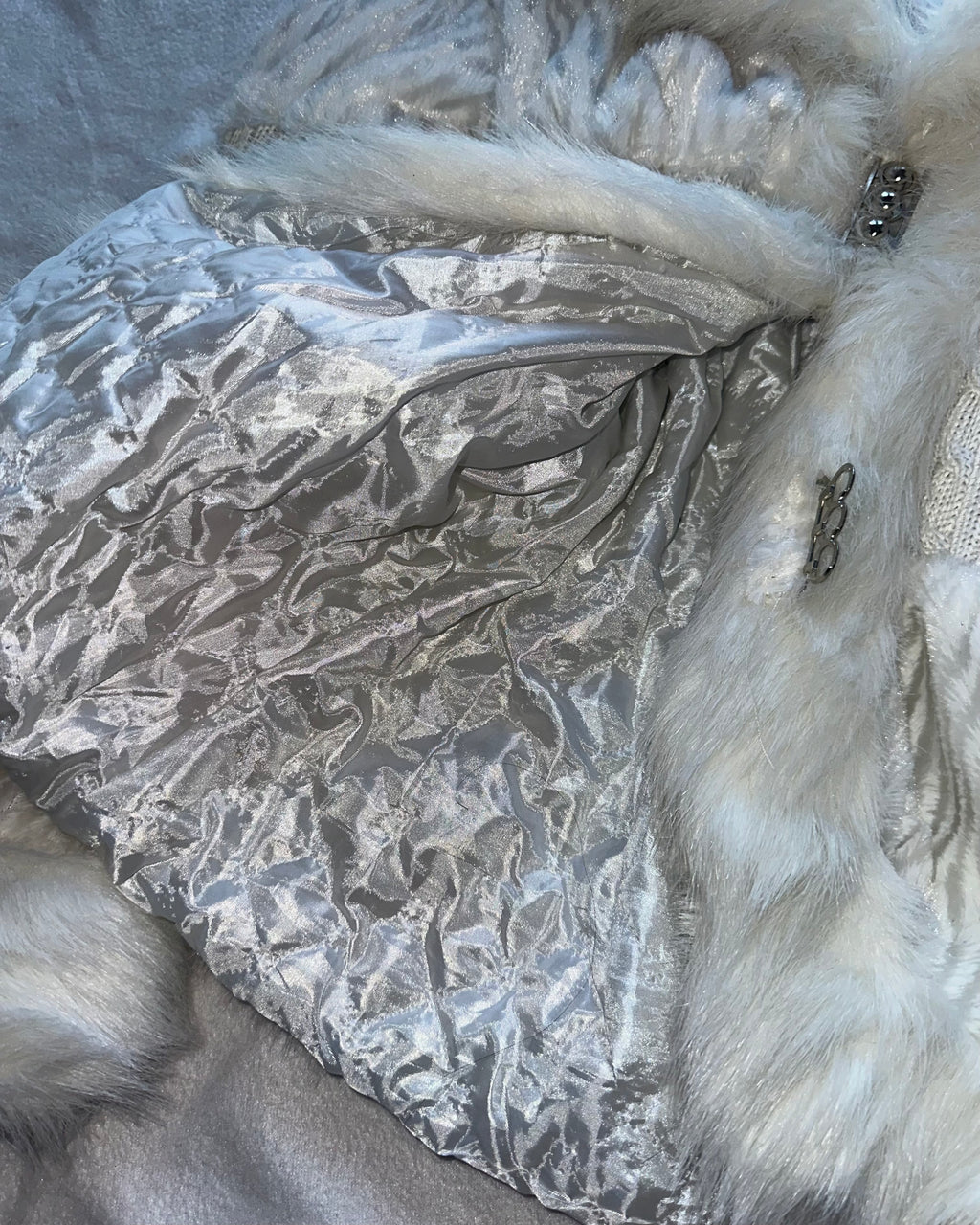 White faux fur coat