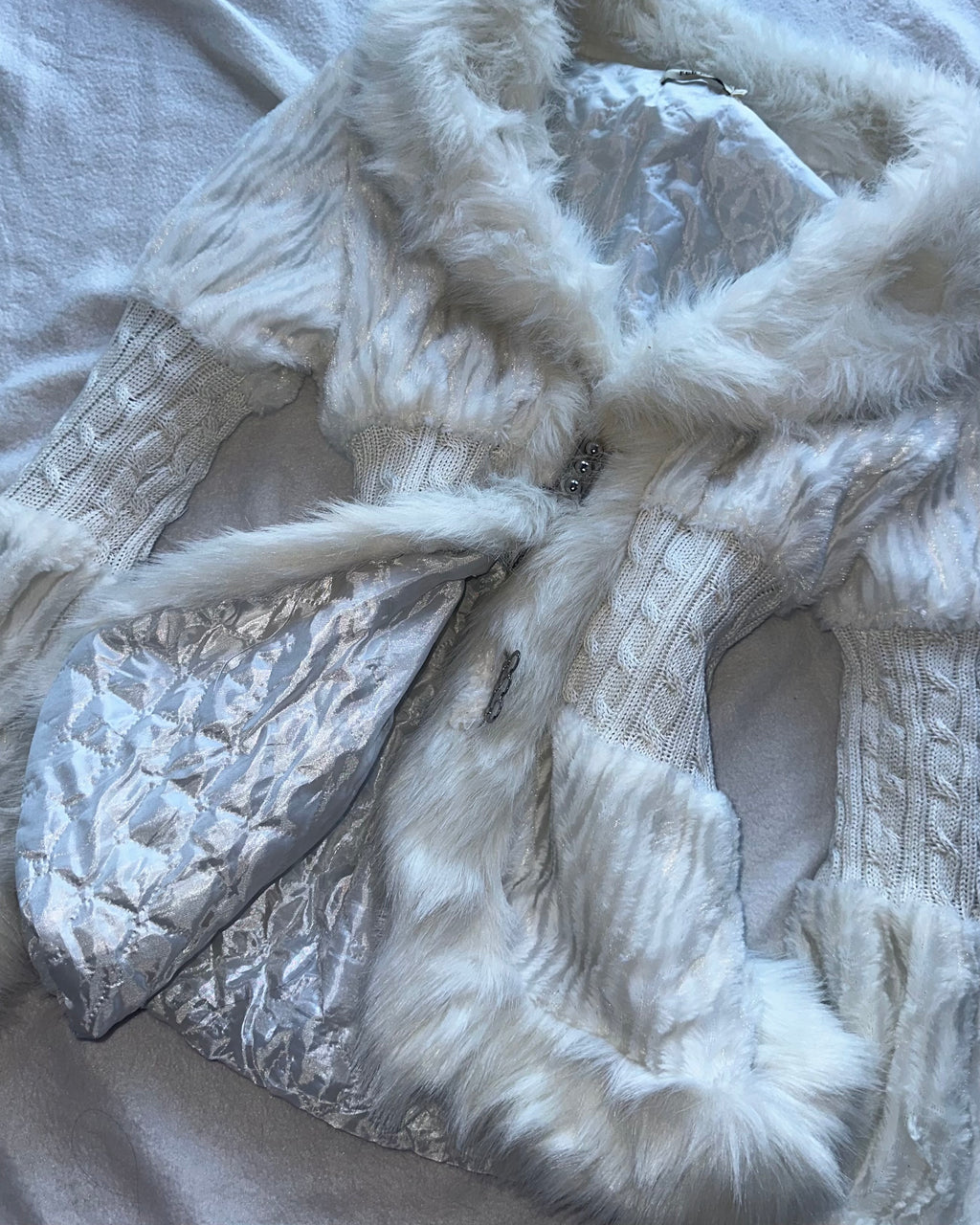 White faux fur coat