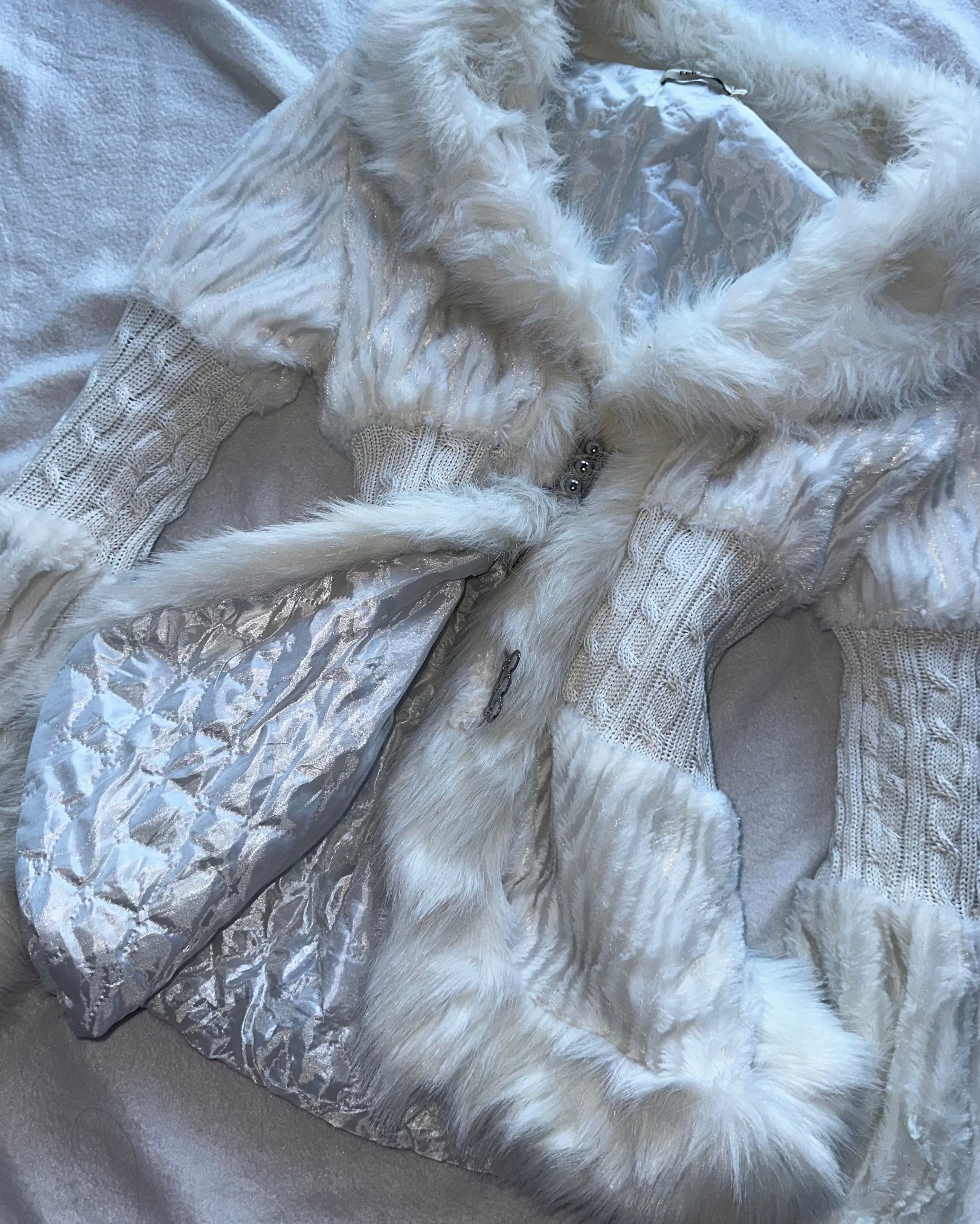 White faux fur coat
